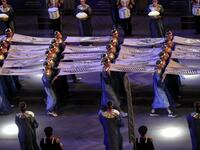 Performers dressed in ancient Egyptian costume march at the start of the parade of 22 ancient Egyptian royal mummies departing from the Egyptian Museum in Cairo's Tahrir Square 