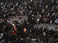 Shiite Muslim devotees take part in a procession 