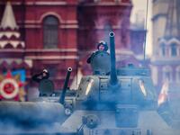 Historical T-34 tanks move through Red Square during the Victory Day military parade in Moscow 