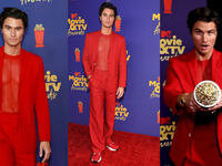 Chase stokes rocked a red Fendi suit and form-fitting see-through top