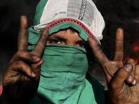 Palestinians burn tires during demonstrations against the expansion of the Jewish settlement outpost of Eviatar, on the lands of Beita village, near the occupied West Bank city of Nablus