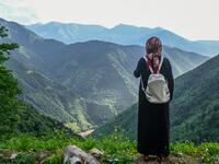 A villager stands at a high point to survey the damage to the hill sides by quarrying in Ikizdere in the Rize Province in the Black Sea region of Turkey on June 7, 2021. A government-friendly company plans to extract 20 million tons of stone from a quarry in the northeastern town of Ikizdere for one of President Recep Tayyip Erdogan's latest development projects. The locals are rising up in protest, challenging the government and its priorities in a region dear to the domineering Turkish leader's heart.