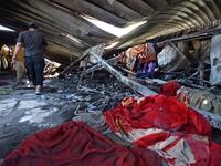 Iraqis Mourn Victims in Covid-19 Facility Hospital Fire