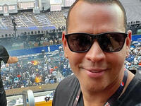 Alex Rodriguez attends the Super Bowl solo