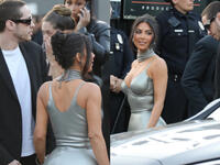 Kim and Pete arriving at The Kardashian's premiere