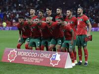 Morocco's players pose for a photograph prior the international friendly football match between Chile and Morocco at the Cornella-El Prat stadium in Cornella de Llobregat on September 23, 2022. (Photo by Josep LAGO / AFP)