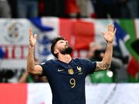 France's forward #09 Olivier Giroud celebrates scoring his team's second goal aduring the Qatar 2022 World Cup quarter-final football match between England and France at the Al-Bayt Stadium in Al Khor, north of Doha, on December 10, 2022. (Photo by GABRIEL BOUYS / AFP)