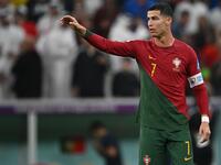 Portugal's forward #07 Cristiano Ronaldo greets the crowd after the Qatar 2022 World Cup round of 16 football match between Portugal and Switzerland at Lusail Stadium in Lusail, north of Doha on December 6, 2022. (Photo by Paul ELLIS / AFP)