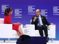 Malaysia's Prime Minister Anwar Ibrahim (R) attends the Qatar Economic Forum in Doha on May 14, 2024. (Photo by KARIM JAAFAR / AFP)