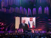 Putin offers arms control extension but warns west against all-out escalation