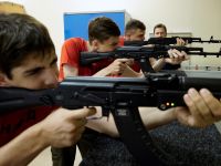 Russian teenagers shooting AKs at school training