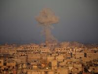 Smoke billows in Zamalka, in the Syrian rebel enclave of Eastern Ghouta on the outskirts of Damascus, during reported shelling by Syrian government forces on Mar. 12, 2018. (Ammar SULEIMAN / AFP)