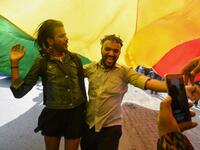 Indian members and supporters of the lesbian, gay, bisexual, transgender (LGBT) community celebrate the Supreme Court decision to strike down a colonial-era ban on gay sex, in Mumbai on September 6, 2018.
INDRANIL MUKHERJEE / AFP