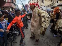 Young Moroccans take part in the Boujloud festival, a popular celebration also known as the 'Moroccan Halloween' in the Sidi Moussa district of Sale near Rabat, on October 27, 2018. 
FADEL SENNA / AFP