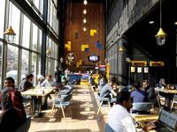 Iraqis sit at "The Station", Baghdad's incubator for would-be entrepreneurs, in the Iraqi capital on November 17, 2018. 
SABAH ARAR / AFP