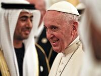 Pope Francis smiles upon his arrival at Abu Dhabi International Airport in the UAE capital on February 3, 2019. 
Andrew Medichini / POOL / AFP