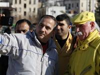Abu Zakkour, Aleppo's so-called 'yellow man' poses for a selfie photograph in the central Saadallah al-Jabiri square in the northern Syrian city on February 11, 2019. 
LOUAI BESHARA / AFP