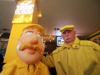 Abu Zakkour, Aleppo's so-called 'yellow man' poses near his statue erected by a local restaurant owner in the northern Syrian city on February 11, 2019. 
LOUAI BESHARA / AFP