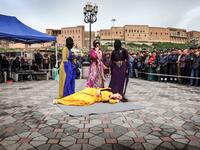 Iraqi Kurdish actresses perform in an open-air play in Arbil, the capital of the northern Iraqi Kurdish autonomous region
SAFIN HAMED / AFP