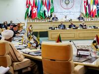 This picture taken on March 29, 2019 shows a view of the preparatory meeting for Arab foreign ministers in the Tunisian capital Tunis, ahead of the 30th annual Arab League summit, with the vacant seat for the Syrian Arab Republic seen in the foreground (R). 
FETHI BELAID / AFP