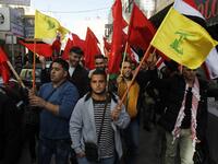 Supporters of the Popular Front for the Liberation of Palestine (PFLP) take part in a demonstration in Bethlehem in the Israeli occupied West Bank, as protests continue in the region amid anger over the U.S. president's recognition of Jerusalem as Israel's capital. 
Musa AL SHAER / AFP