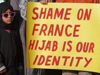Shame-on-france-hijab-is-our-identity-french-authorities-ban-women-sign-protest-www.barenakedislam.com-2015