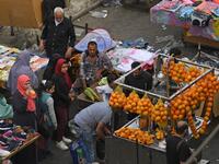 Election fever downmarket, people take to buying oranges (AFP/File Photo). 