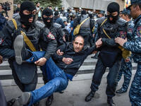 During mass protests in Yerevan against the ex-president's election as prime minister. Police detained hundreds of protesters  (AFP/File Photo).	
