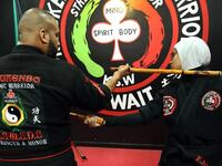 Kuwaiti women practise hybrid martial art Kajukenbo in a club in Kuwait City.
Yasser Al-Zayyat / AFP