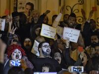 Tunisians demonstrate against the upcoming visit of Saudi Crown Prince Mohammed bin Salman to Tunisia, in November 26, 2018 in the capital Tunis. The sign in Arabic reads "No to the desecration of Tunisia, country of the revolution". 
AFP