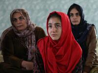Women and young girls listen to Rasul, an Iraqi Kurdish activist with the non-profit organisation WADI, as she peaks about the harms of genital mutilation in Sharboty Saghira, a small village east of regional capital Arbil.
SAFIN HAMED / AFP