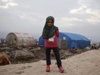 Syrian Maya Merhi poses for a picture in the Internally Displaced Persons (IDP) camp of Serjilla in northwestern Syria next to Bab al-Hawa border crossing with Turkey.
Aaref WATAD / AFP