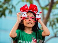 A kid takes part of the Christmas parade in Panama City on December 16, 2018. 
Luis ACOSTA / AFP