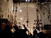 Tourists and pilgrims visit the Church of the Nativity in the Biblical West Bank city of Bethlehem, on December 22, 2018, three days ahead of the Christmas celebration. Thomas Coex/AFP