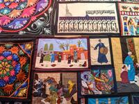 This picture shows tapestries hanging on the wall of a shop in Khayamiya Street, or the Street of Tent-makers, in the old city of the Egyptian capital Cairo. Mohamed el-Shahed / AFP