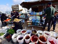 Street vendors sell pickles and vegetables in the souk or market of Al-Hol camp for displaced people in northeastern Syria
GIUSEPPE CACACE / AFP