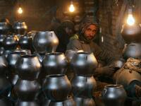 In this photo an Afghan labourer makes metal pots at an aluminum factory in Herat. 
HOSHANG HASHIMI / AFP