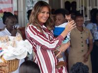 US First Lady Melania Trump holds a baby during a visit to the Greater Accra Regional Hospital in Accra, on October 2, 2018. (SAUL LOEB / AFP)

