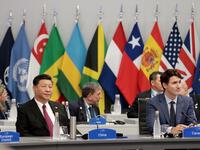 China's President Xi Jinping(R) and Canadian Prime Minister Justin Trudeau attend the G20 Leaders' Summit in Buenos Aires, on November 30, 2018. 
Alejandro PAGNI / AFP