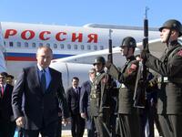 President of Russia, Vladimir Putin (L) arrives at Ataturk International Airport in Istanbul on October 27, 2018, ahead of a summit called to attempt to find a lasting politicial solution to the civil war in Syria which has claimed in excess of 350,000 lives. (Sergei GUNEEV / Sputnik / AFP)