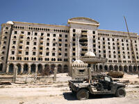 The Fight for Benghazi:

Haftar’s army began an assault on the Islamist-held city of Benghazi in 2014. The operation saw the Libyan National Army fighting jihadist groups such as IS and the Shura Council of Benghazi Revolutionaries. The city was ‘liberated’ by Haftar’s forces by July 2017.

(Photo: A destroyed building in Benghazi)