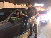 Police distributed flowers to women drivers on their first day of driving in the country. (Twitter) 