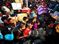 INDONESIA, JAKARTA: Eid preparations include city workers traveling to be with family, making their way home to celebrate Eid.  A  mini migration of Indonesians, seen at this Jakarta train station, heading to their hometowns to celebrate the close of this month of faithful devotion and to enjoy a break from work in the city.