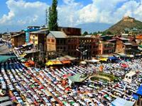 India: Kashmiri Muslims offer Jummat-Ul-Vida, the last Friday prayers, ahead of the Eid al-Fitr festival outside the historic Jamia Masjid mosque in Srinagar. On Eid, after taking a fresh bath, everyone wears new clothes, if they can afford so, or else clean washed clothes. Some Muslims go to graveyards to pray for salvation of the departed soul. 