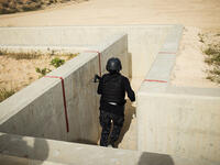 The all-women's Unit 30 SWAT Police team from Jordan competes in the three-gun gauntlet during the Warrior Competition. Jordan was the only country with a women’s team in the running at the competition.

