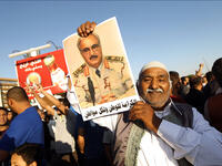 In June 2014, elections are held in Libya, but violence prevents many from casting votes. Nevertheless, a new parliament is sworn into office, lending its support to Haftar, the rogue general. The election sees Islamist groups lose out big time. 

