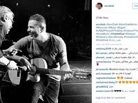 Amr Diab playing the guitar