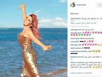 Samira Said at the beach