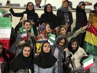 Iranian women take a selfie during the friendly football match between Iran and Bolivia at the Azadi Stadium in Tehran. (STR / AFP)