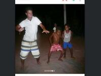 silly white guy dancing with black kids